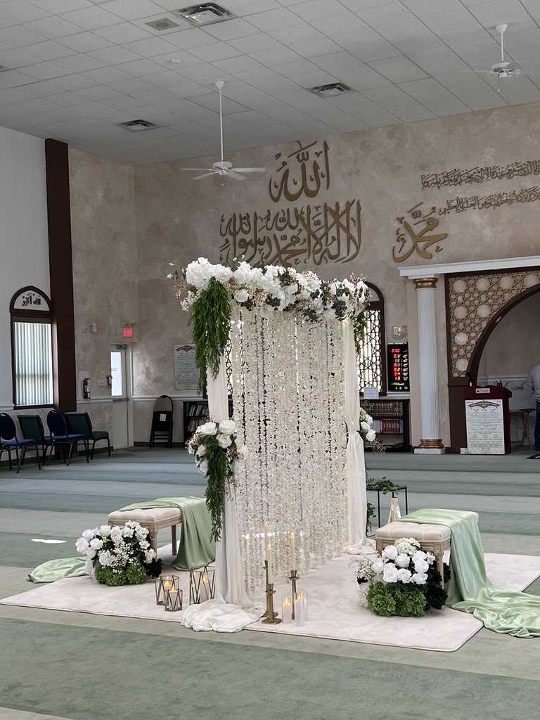 Elegant white floral Nikkah divider styled by Khwaab Events inside a mosque